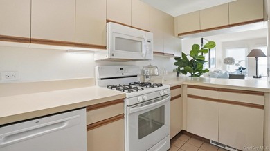 Welcome to 49 Canoe Place Rd, Unit 416, a charming coastal - photo 15