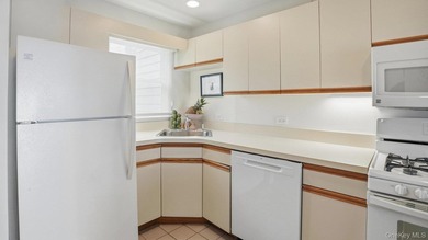 Welcome to 49 Canoe Place Rd, Unit 416, a charming coastal - photo 16