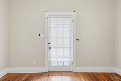 Situated on a corner lot and adorned with majestic oak trees - photo 8