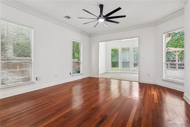 Beautifully maintained home featuring rich hardwood flooring - photo 12