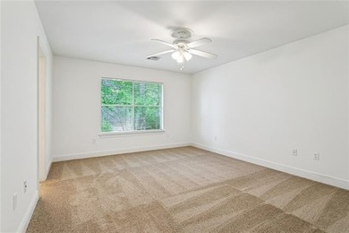 Beautifully maintained home featuring rich hardwood flooring - photo 23
