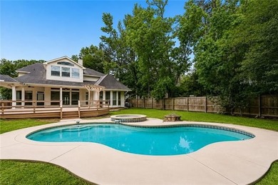 Beautifully maintained home featuring rich hardwood flooring - photo 31