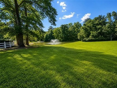 Beautifully maintained home featuring rich hardwood flooring - photo 37