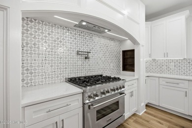 This JUST COMPLETED stunning new construction residence is ready - photo 8
