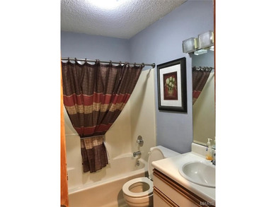 Updated 3rd-floor condo in Osage Vistas at Lake Ozark offering a - photo 10
