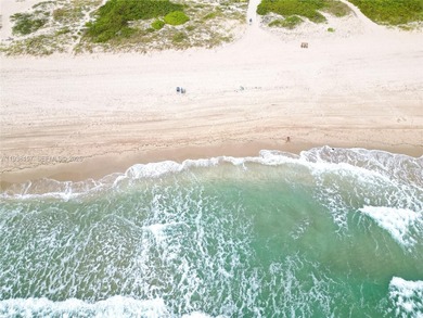 Immerse yourself in refined oceanfront living where every