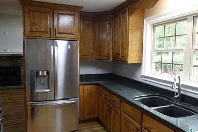 This is a spacious home with 13.55 acres with unlimited rental - photo 12