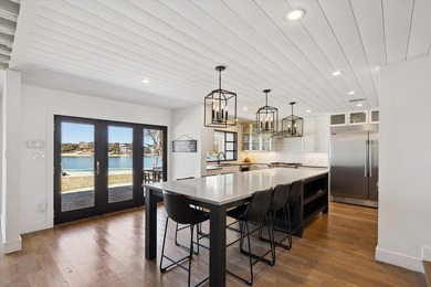 Exceptional waterfront home with contemporary design set against - photo 12