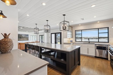Exceptional waterfront home with contemporary design set against - photo 13