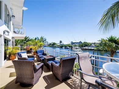 A rare waterfront estate along a 200-foot wide canal with a - photo 15