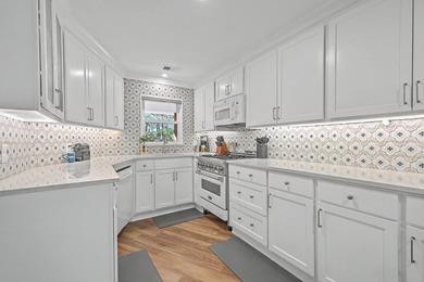 Tucked away on a quiet cul-de-sac, this beautifully renovated - photo 17