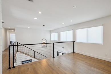 Exceptional waterfront home with contemporary design set against - photo 17