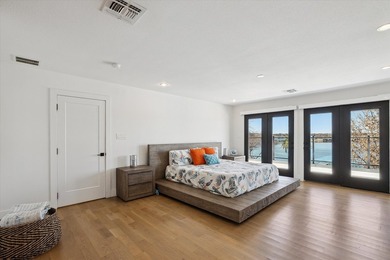 Exceptional waterfront home with contemporary design set against - photo 19