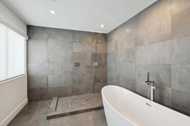 Exceptional waterfront home with contemporary design set against - photo 22