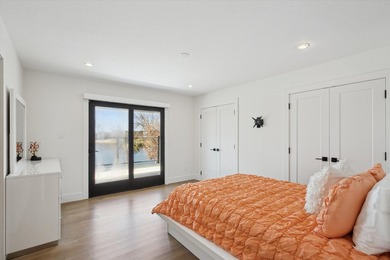 Exceptional waterfront home with contemporary design set against - photo 23