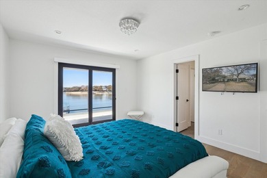 Exceptional waterfront home with contemporary design set against - photo 26