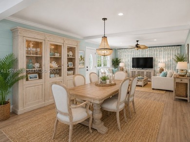 A rare waterfront estate along a 200-foot wide canal with a - photo 32