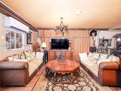 A rare waterfront estate along a 200-foot wide canal with a - photo 38
