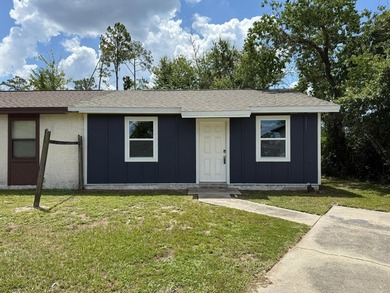 Investor Special! This partially renovated gem in Panama City is - photo 1
