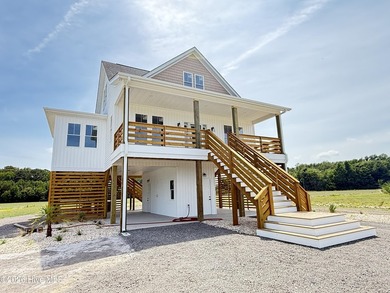 Come experience country and class in this coastal craftsman! And - photo 3
