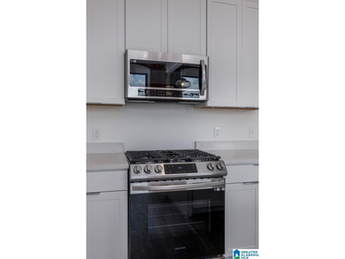 Welcome to this beautiful corner unit condominium on the 3rd