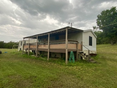Enjoy peaceful country living in this 16x80 mobile home situated - photo 14