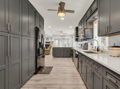 Spacious waterfront home with a total of 4 car garages! - photo 9
