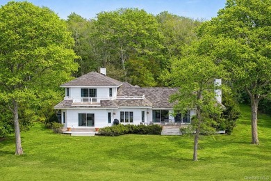 Quogue Waterfront Tucked away on a quiet, coveted creek in - photo 3