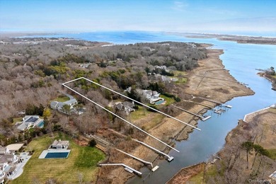 Quogue Waterfront Tucked away on a quiet, coveted creek in - photo 4