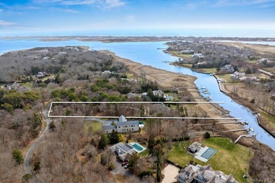 Quogue Waterfront Tucked away on a quiet, coveted creek in - photo 6