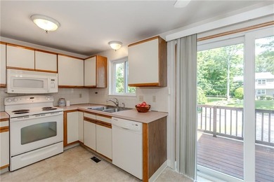 Step into this welcoming townhouse style unit located in - photo 12