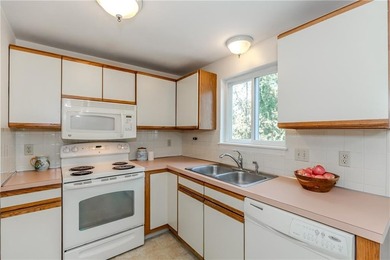 Step into this welcoming townhouse style unit located in - photo 13