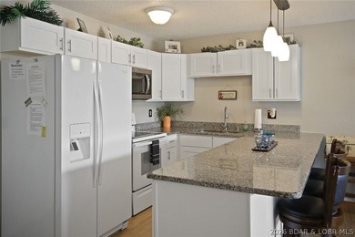 Enjoy lake living at its finest in this beautifully updated - photo 11