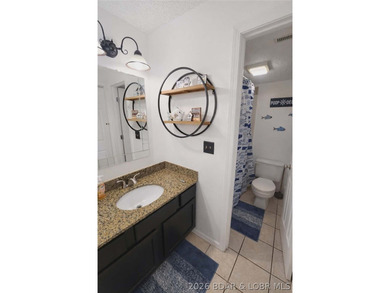 Enjoy lake living at its finest in this beautifully updated - photo 17