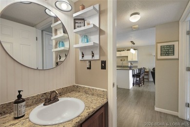 Enjoy lake living at its finest in this beautifully updated - photo 18