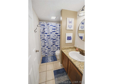 Enjoy lake living at its finest in this beautifully updated - photo 19