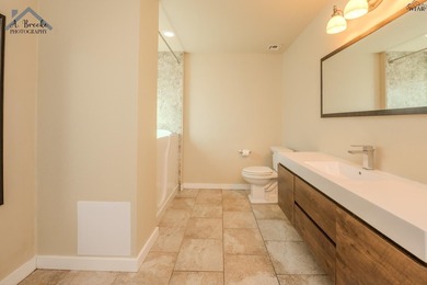 Unique modern lakefront home featuring 3 bedrooms, 2 full baths - photo 10