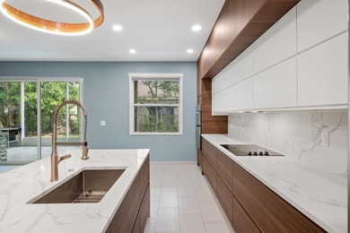 Wow! 180K in upgrades on this beautiful 4-bedroom, 3-bath home - photo 13