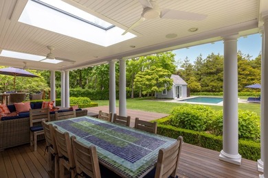 Set on a quiet private block in the heart of Water Mill, this - photo 26