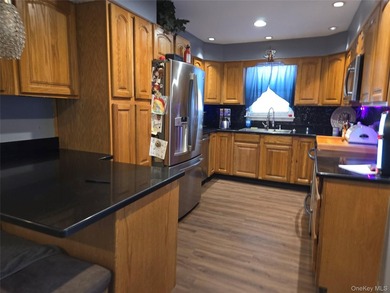 Spacious North Shirley Colonial approximately 2500 SQ Ft Windows - photo 15