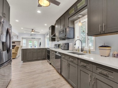 Spacious waterfront home with a total of 4 car garages! - photo 7