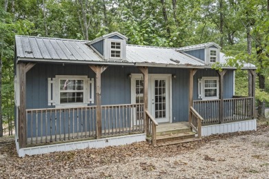 Discover this charming ''She Shed'' on a spacious half-acre lot - Lake Lot For Sale in Branson West, Missouri