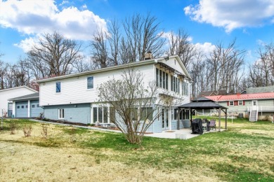 Spacious waterfront home with a total of 4 car garages! - photo 1