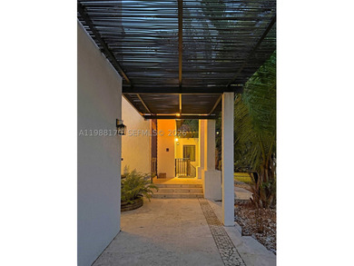 Set on one of Coral Gables finest tree-lined streets, this - photo 11