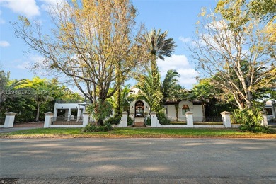 Set on one of Coral Gables finest tree-lined streets, this - photo 12