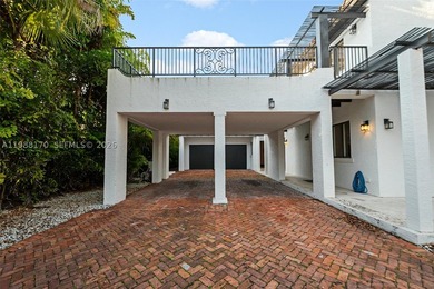Set on one of Coral Gables finest tree-lined streets, this - photo 13