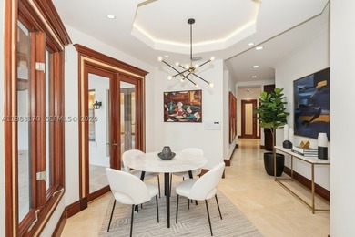 Set on one of Coral Gables finest tree-lined streets, this - photo 20
