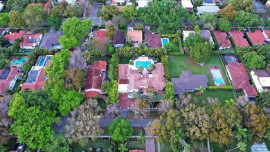 Set on one of Coral Gables finest tree-lined streets, this - photo 32
