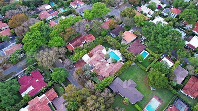 Set on one of Coral Gables finest tree-lined streets, this - photo 33