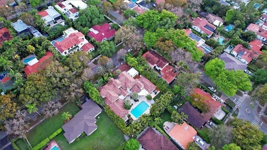 Set on one of Coral Gables finest tree-lined streets, this - photo 34